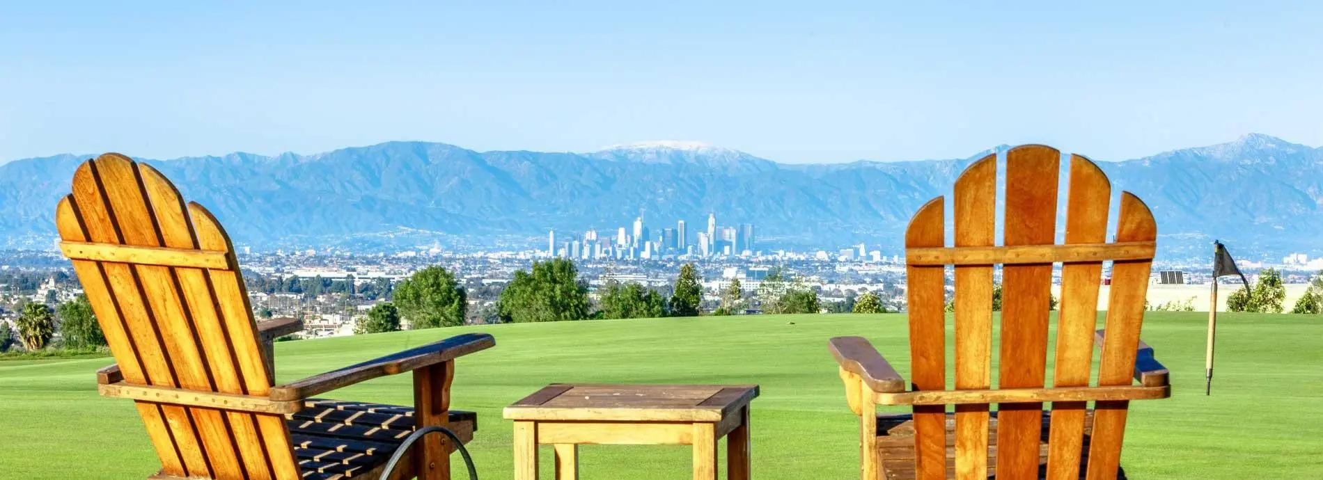Two Lounge Chairs Overlooking Rolling Hills Country Club Golf Course
